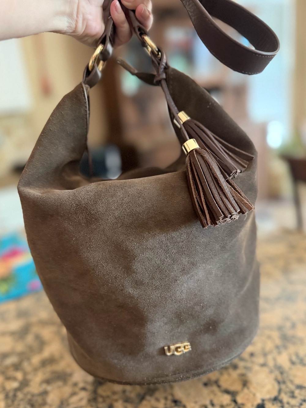 UGG suede hobo bucket bag with tassels in brown